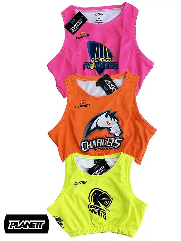 Three colorful athletic tank tops.