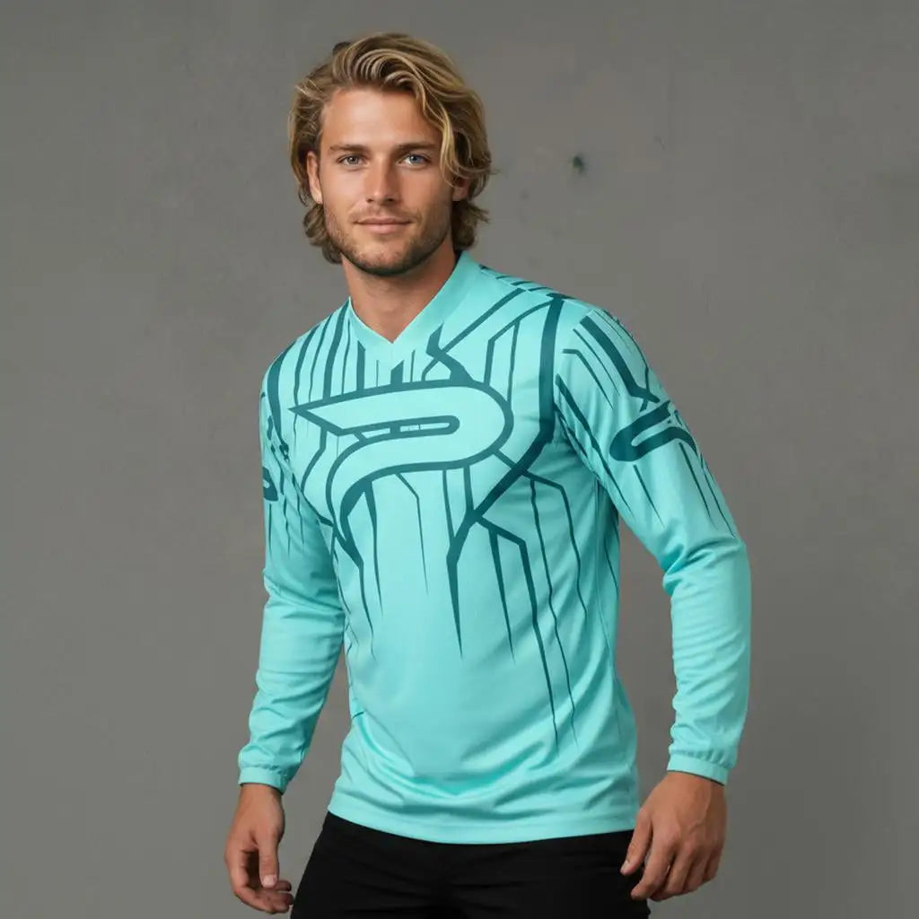 Turquoise long-sleeved jersey with a bold graphic design featuring the letter ’p’ in teal and black.
