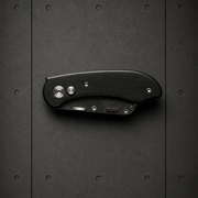 Utility Knife 1509 blank product on dark industrial concrete background
