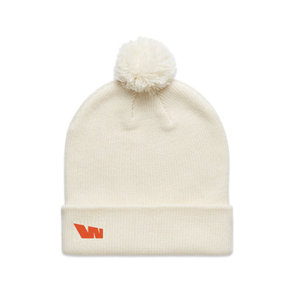 Cream-colored knit beanie with pompom.