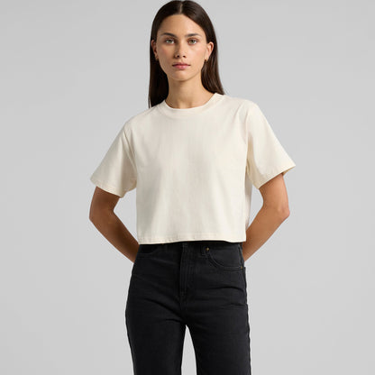 Cream-colored oversized t-shirt with short sleeves and a relaxed fit.