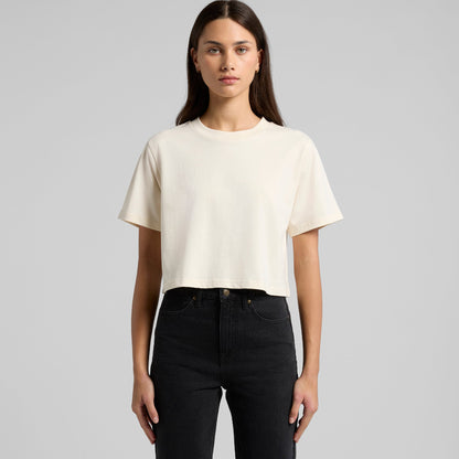 Cream-colored cropped t-shirt with short sleeves and a relaxed fit, likely made of cotton or polyester blend.