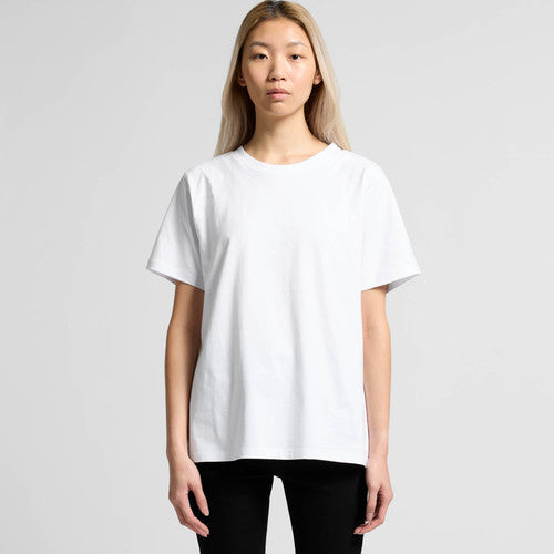 White oversized t-shirt with black leggings and a relaxed fit.