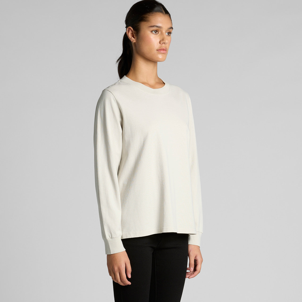 Cream long-sleeved crew neck sweater with a relaxed fit and ribbed cuffs, inspired by everlane’s minimalist design.
