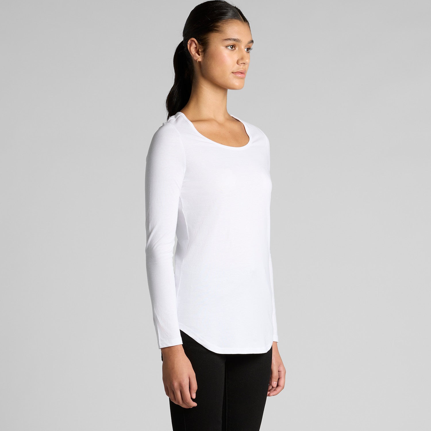 White long-sleeved top with a scooped neckline and ribbed cuffs, likely made of stretchy fabric.