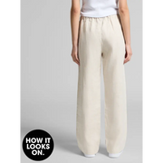 Beige wide-leg pants.