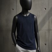 Youth Barnard Tank 3010 blank product on dark industrial concrete background
