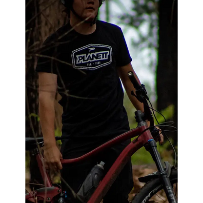 Man with mountain bike.