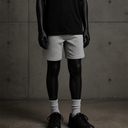 Youth Stadium Shorts 3026 blank product on dark industrial concrete background
