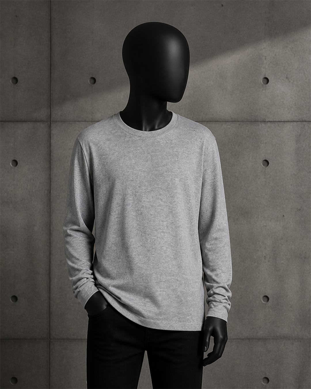 Youth Staple L/S Tee 3008 blank product on dark industrial concrete background